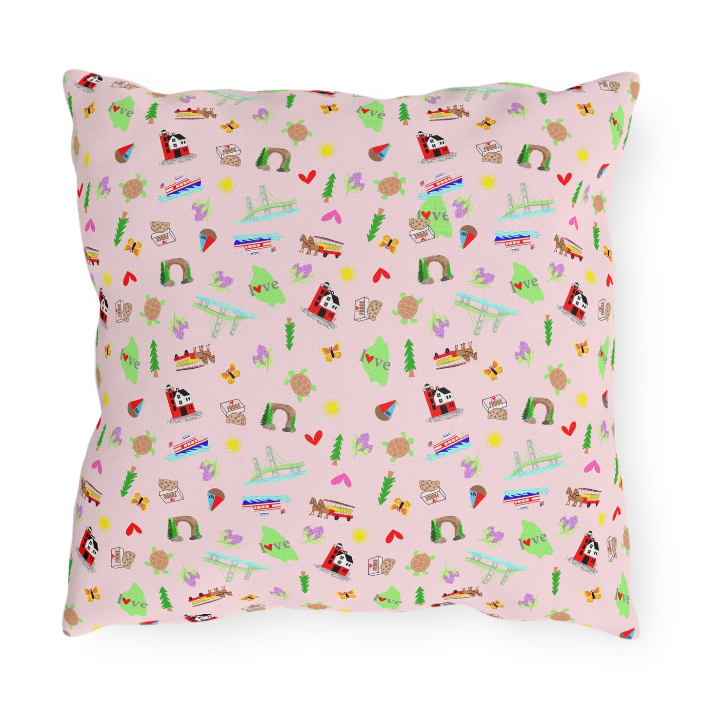Close-up of colorful Mackinac Island outdoor throw pillow featuring whimsical Michigan outwork