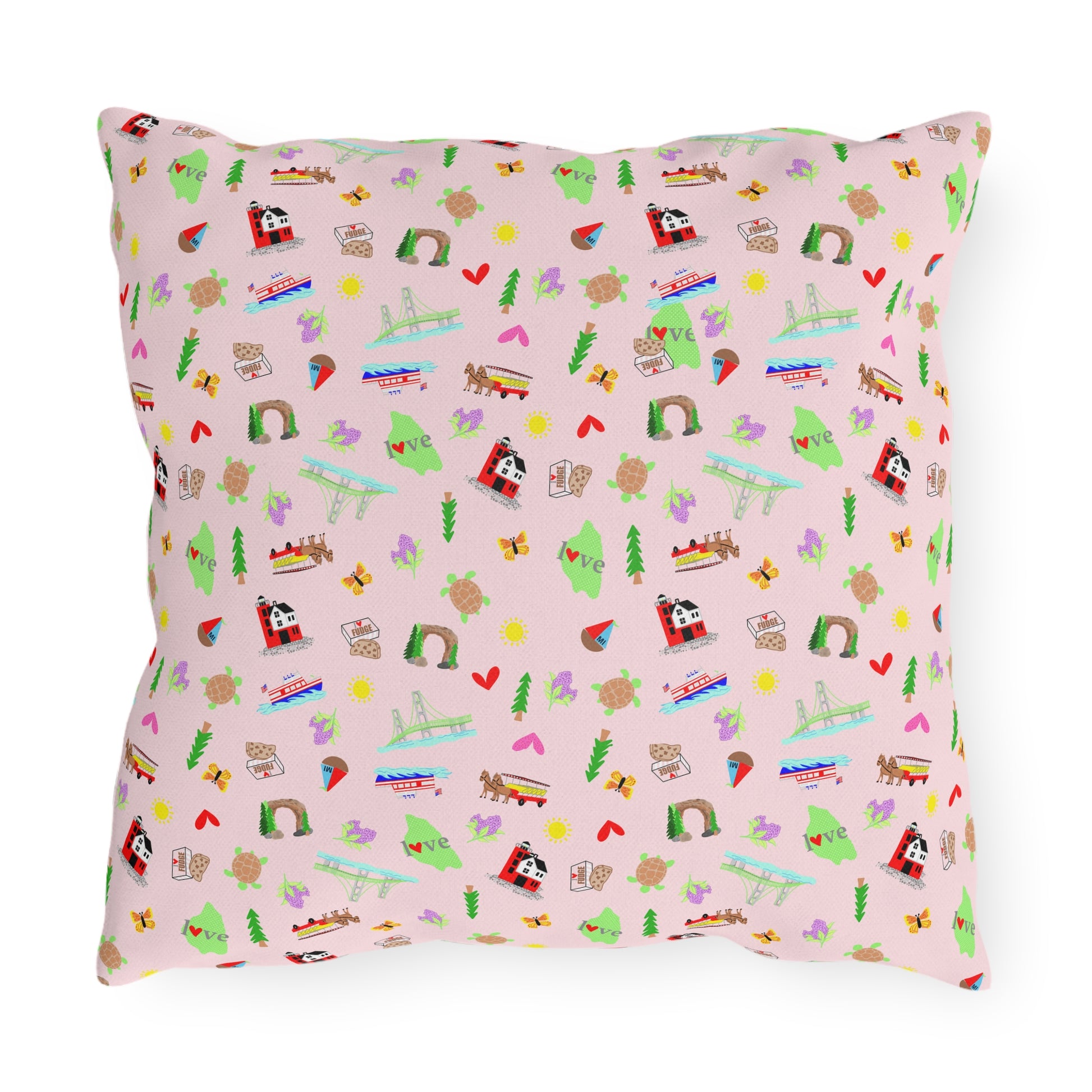 Close-up of colorful Mackinac Island outdoor throw pillow featuring whimsical Michigan outwork