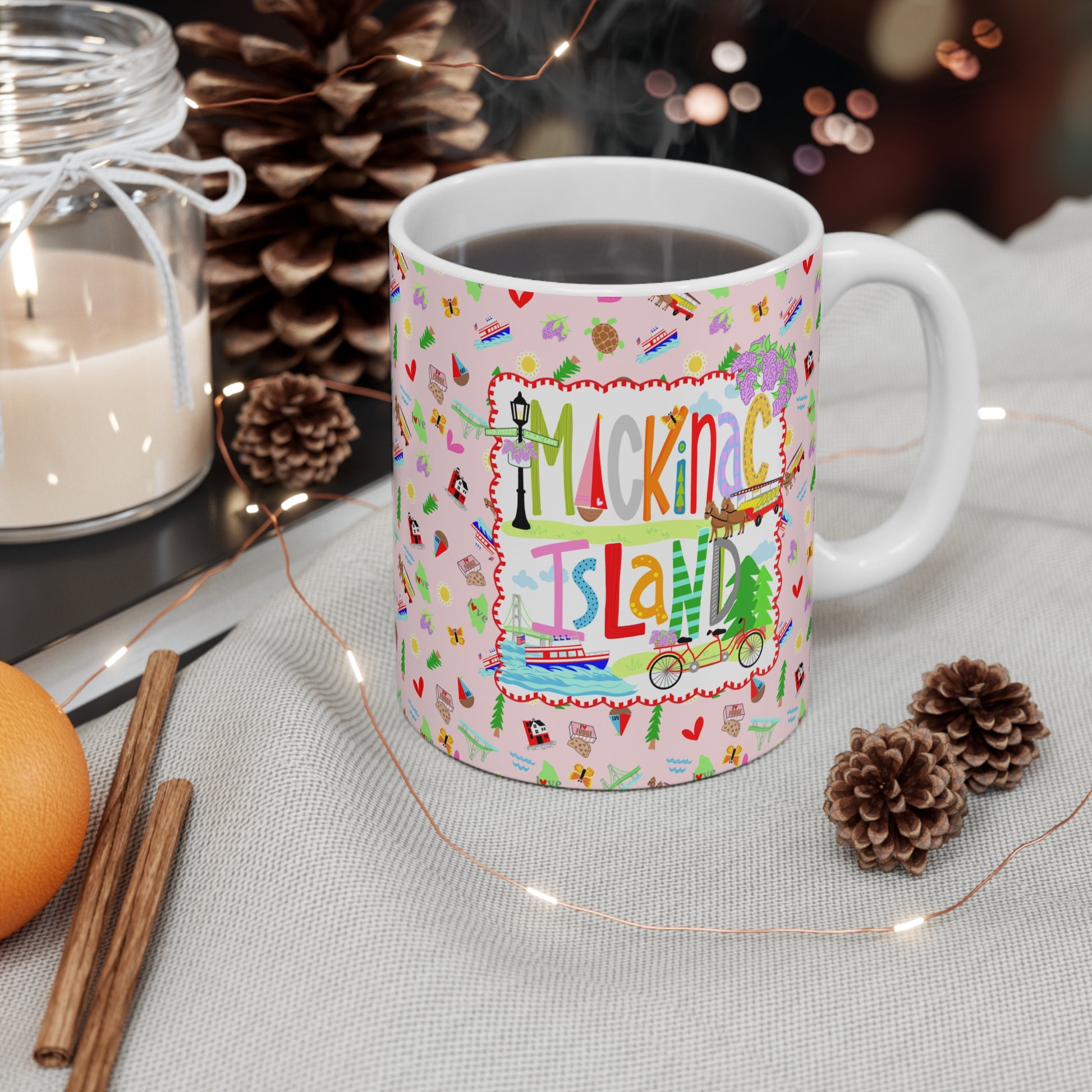 Cozy up with a little Mackinac Island magic this holiday season. Displayed beside twinkling Christmas lights, this colorful ceramic mug brings warmth and festive charm to every cup of coffee, tea, or hot cocoa. A thoughtful Christmas gift for Mackinac Island lovers, Michigan travelers, and anyone who enjoys cozy winter mornings and meaningful keepsakes.