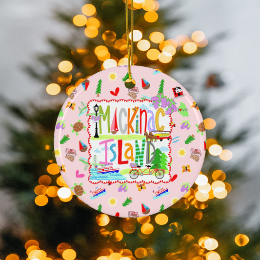 Personalized Mackinac Island ceramic Christmas ornament featuring whimsical island map artwork with custom family name.