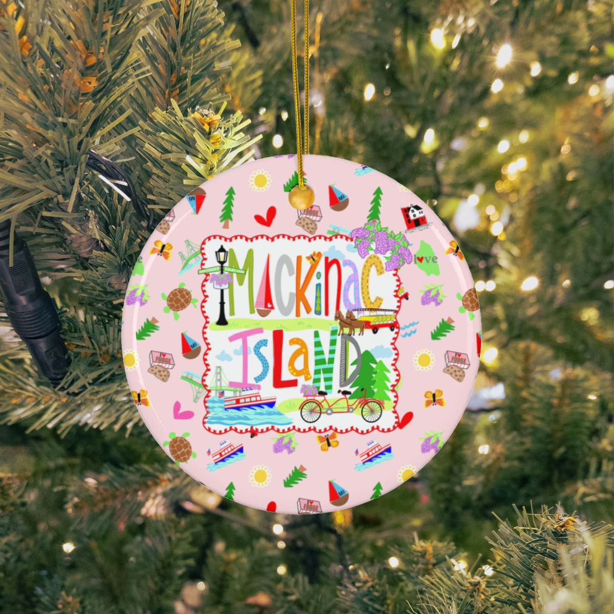 Personalized Mackinac Island Christmas ornament with colorful illustrated island map and custom family name.
